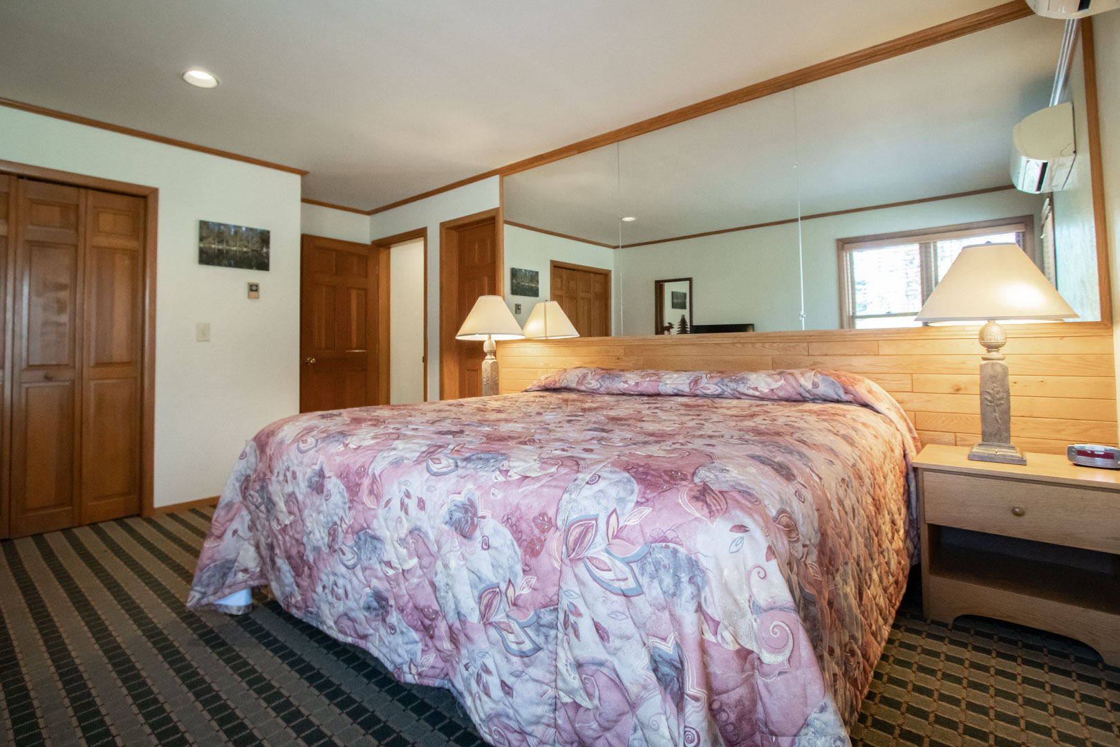 A spacious master bedroom at VRI's Sunburst Resort in Steamboat Springs, Colorado.